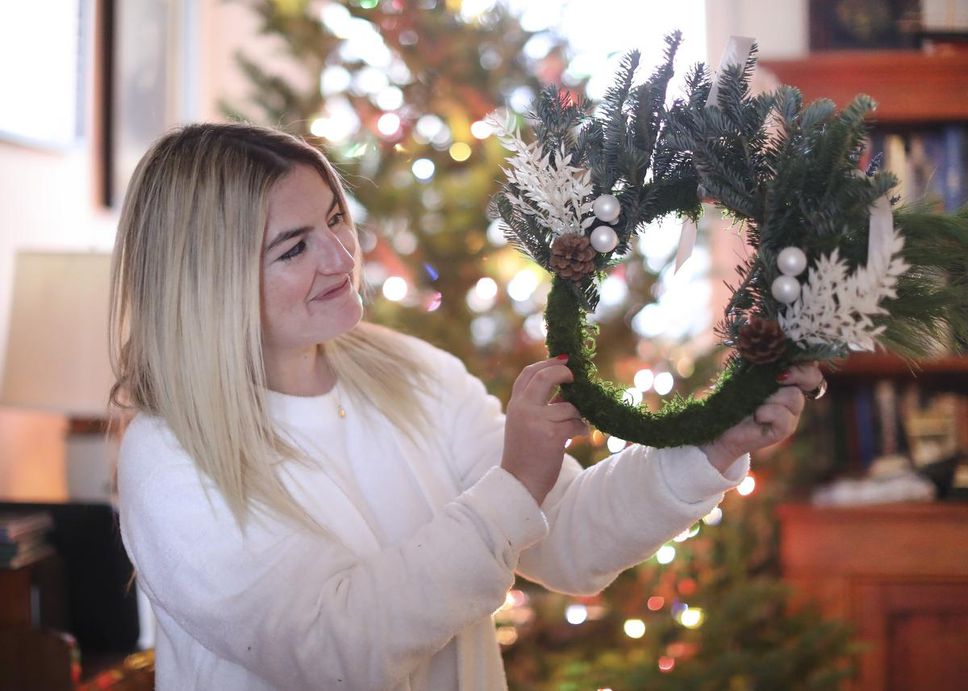 TORONTO, ON - December 4   Star freelancer Jen Kirsch takes part in a virtual wreath making session in her house as she sips CBD infused 
Tea.  She is seen in her west end living room with all of the wreath materials as she takes sips of a new CBD infused tea.
December 4 2020 Richard Lautens/Toronto Star